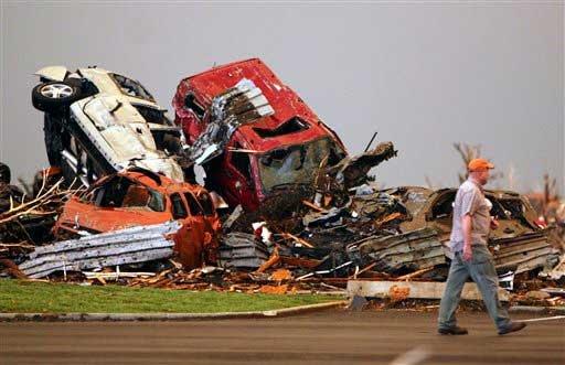 Pile of cars thrown by the tornado.